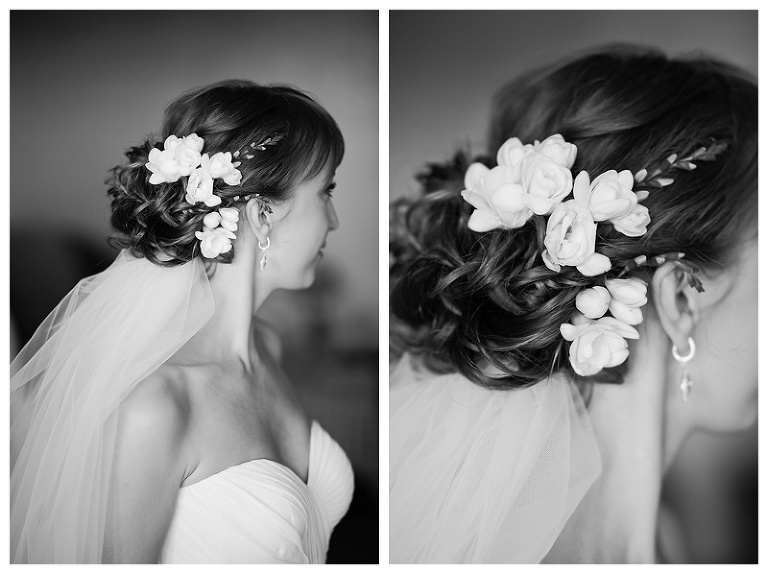 Flower in brides hair b/w